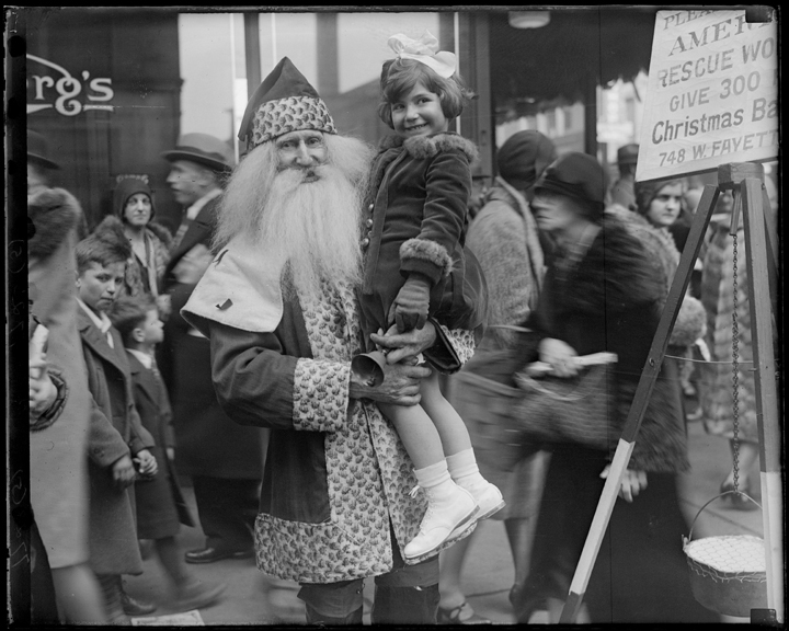 Santa holding little girl, ca 1930, A. Aubrey Bodine, MdHS, MC7723-5.