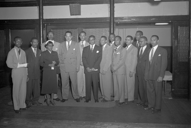 Thurgood Marshall (fifth from left), Esther McCready (second from left), Darnall Stewart, Earl Koger, Donald Gaines Murray, Parren Mitchell, Harry A. Cole, Linwood Koger, Ernest Whittle, and James Biddy Woods." Paul S. Henderson, September, 1950. MdHS, HEN.02.07-019.