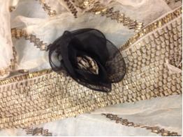 These uncatalogued gold-embroidered fragments with silk posey embellishment came from a costly muslin gown, likely purchased for Elizabeth by then-husband Jérôme Bonaparte.  “Gold and Silver Muslin” shows up in numerous inventories, the latest dated 1862, MdHS Museum Collection. (Reference Photograph)