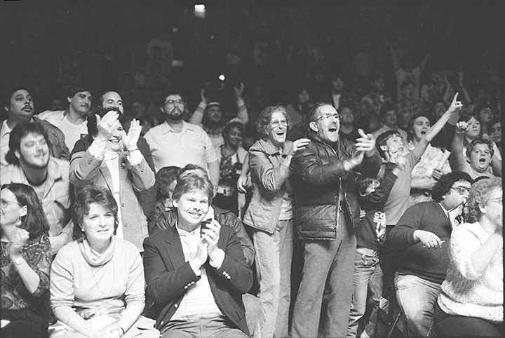 Professional wrestling fans. Possibly Georgette Krieger (standing middle with hand on man in coat), date unknown. Joseph Kohl Collection, PP284, MdHS.