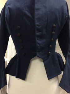 Closeup of double breasted jacket.