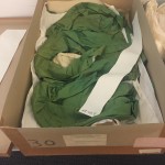 Garments were not stored with padding and have wrinkled in their old boxes