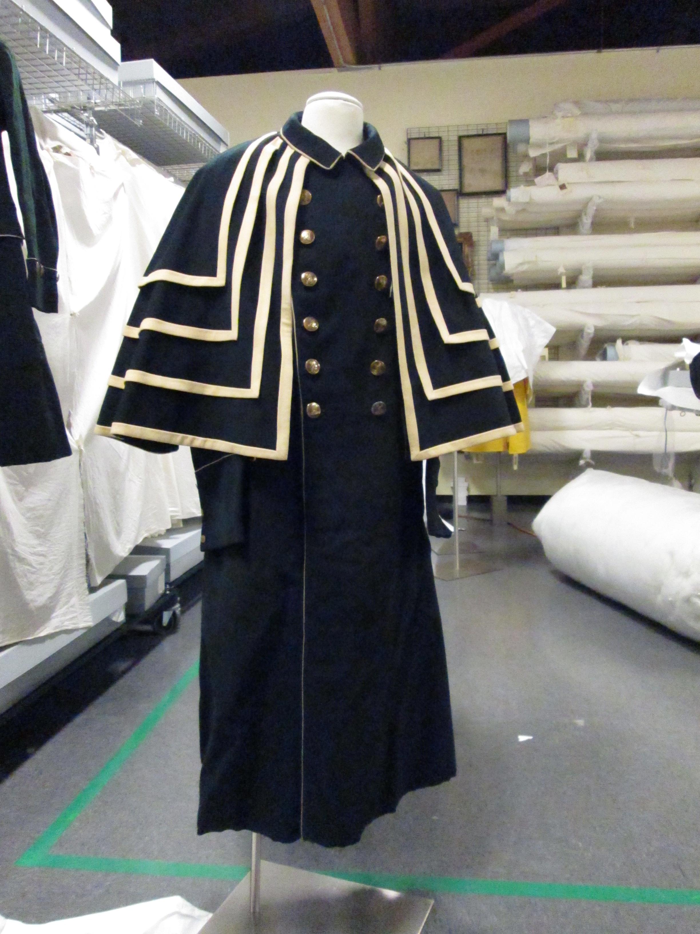 cape with long coat front