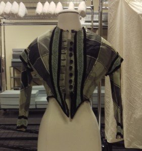 Plaids were popular in the 19th century and copper arsenite might have been used for the greens of this bodice. 