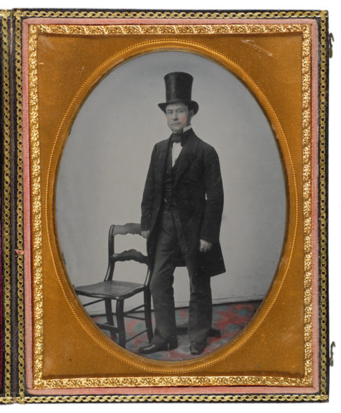 Historic photo of man in top hat.