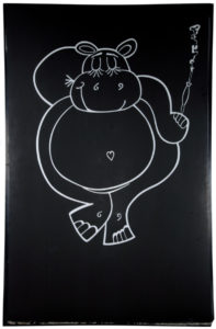 A black sign with a white cartoon drawing of a hippo with its eyes closed and one hand behind its head, the other holding a cigarette.